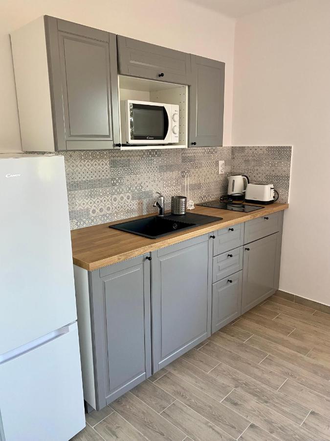 Pacsirta Apartman Grand Eger Buitenkant foto